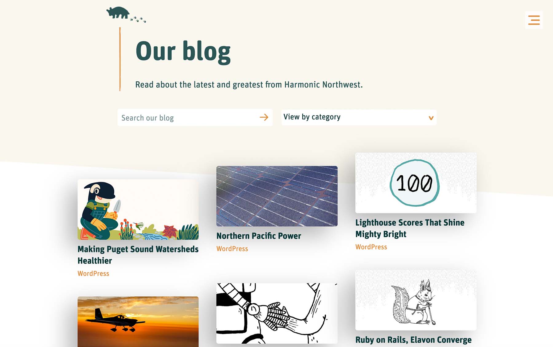 A screenshot from harmonicnw.com featuring a grid of blog posts